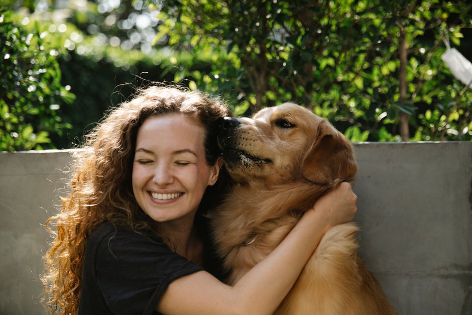 Deanna with a happy dog